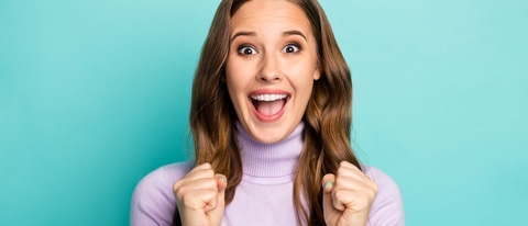 Photo of beautiful funny lady hold hands fists raised yelling loud supporting favorite sports team competition wear purple jumper isolated teal blue pastel color background; Shutterstock ID 1655650954; purchase_order: 611232 ; job: MarCom The Netherlands ; client: Nunhems Netherlands BV ; other: Requested by Mirriam